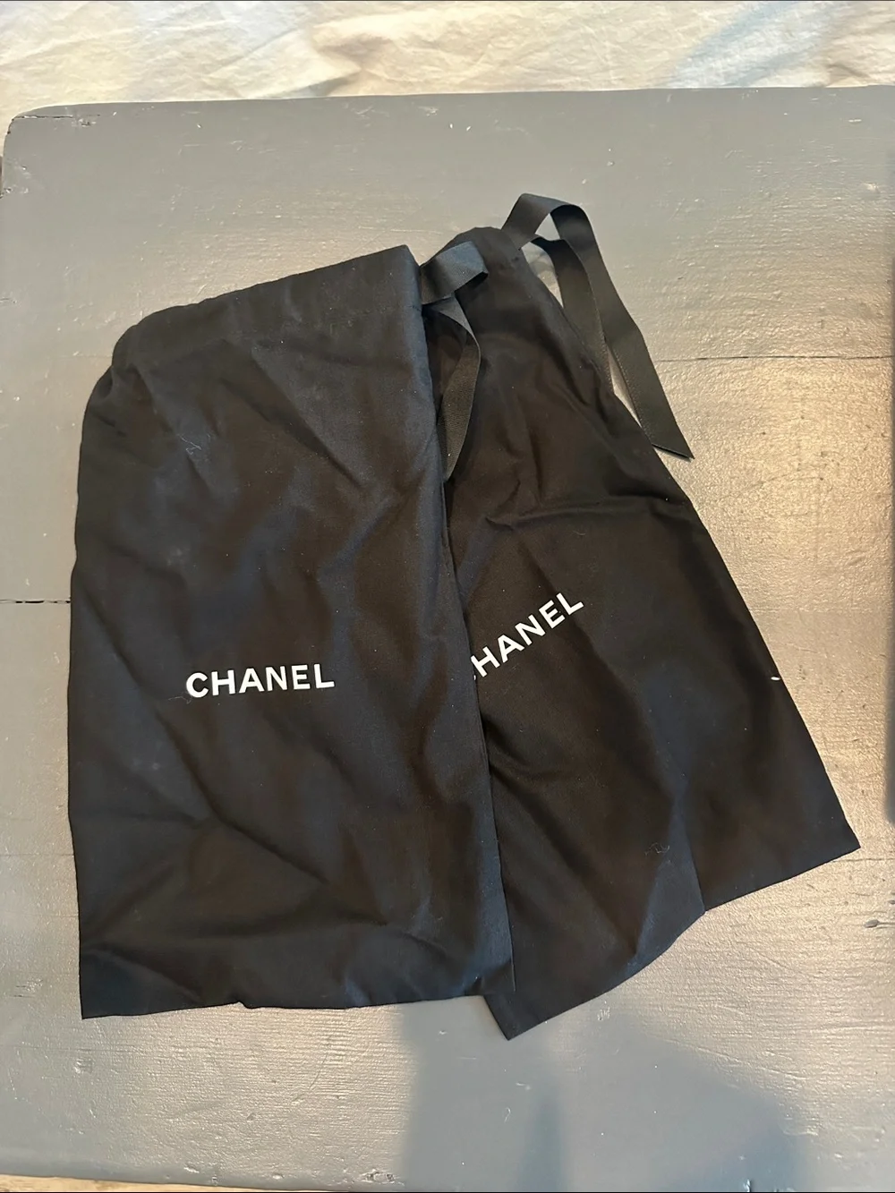 CHANEL Black and Beige Crochet Cap-Toe Ballet Flats